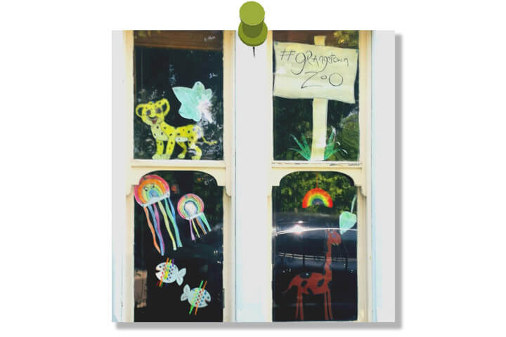 Window decorated with rainbows and animals during lockdown 2020. Reads #GrangetownZoo